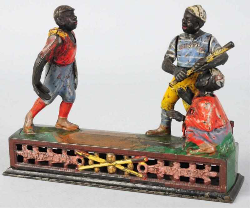 Appraisal: Cast Iron Darktown Battery Mechanical Bank Manufactured by J E