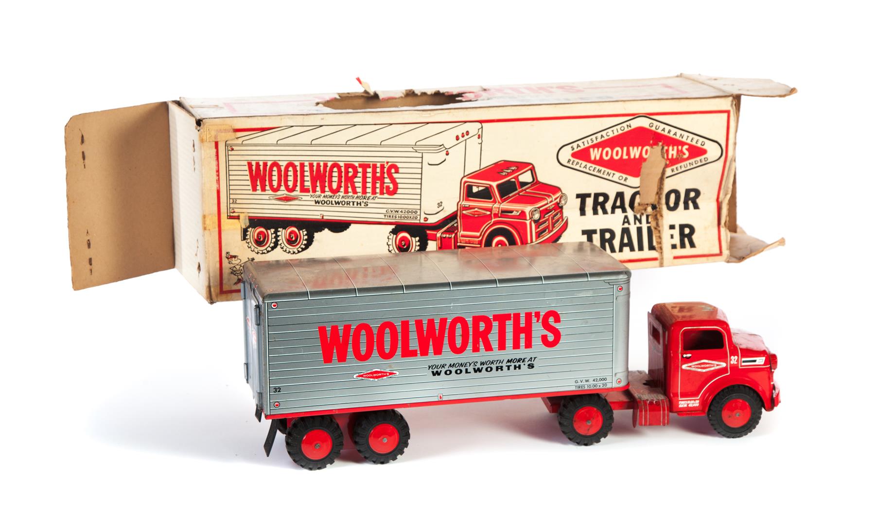 Appraisal: WOOLWORTH'S TRACTOR AND TRAILER CHILD'S TIN TOY American nd half-