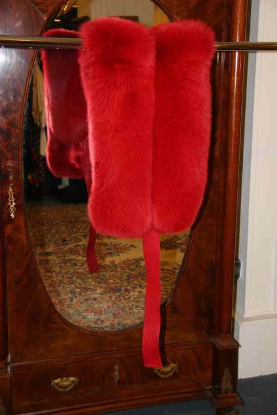 Appraisal: RED FOX FUR AND LEATHER WRAP With red satin lining