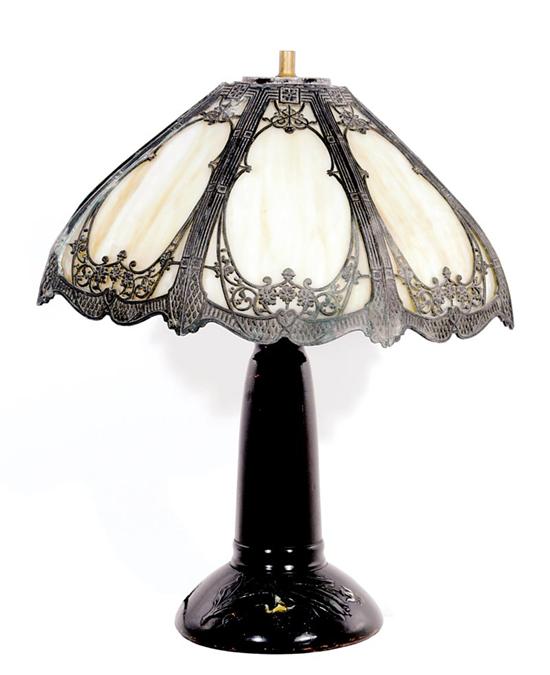 Appraisal: American slag glass shaped table lamp ornate octagonal framed shade