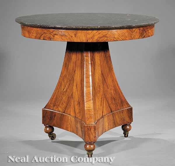 Appraisal: A French Restauration Figured Walnut Gu ridon early th c