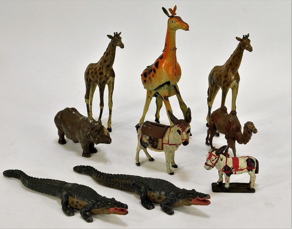 Appraisal: PC Assorted Wild Animal Cast Iron and Tin Toys United