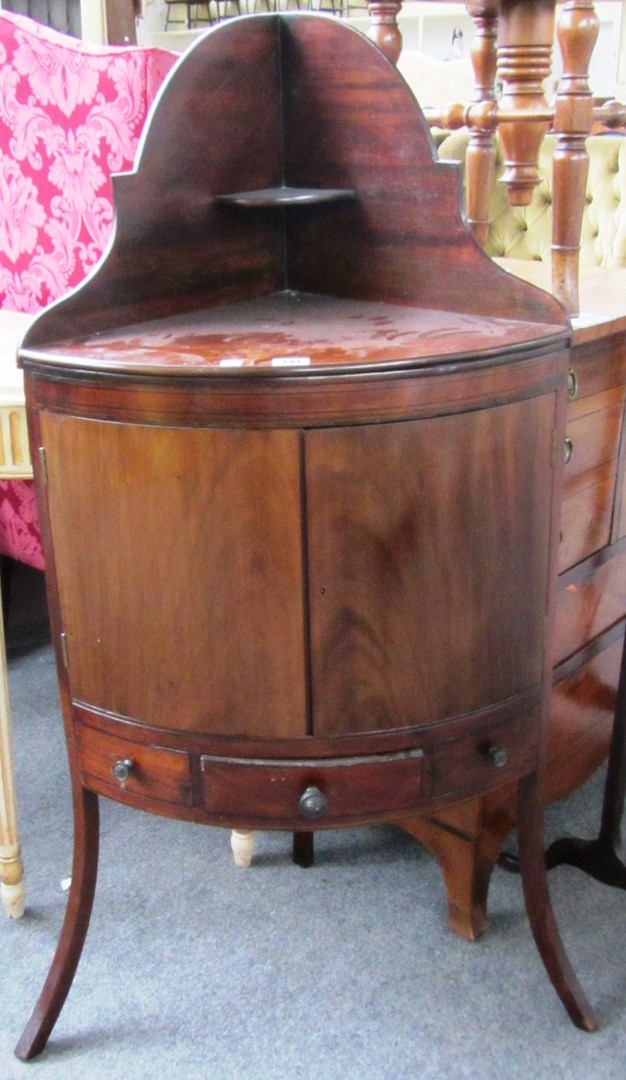 Appraisal: A Regency mahogany bowfront wash stand a Victorian fruitwood height