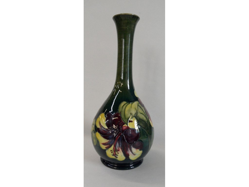 Appraisal: Moorcroft 'Hibiscus' pattern bottle vase on green ground