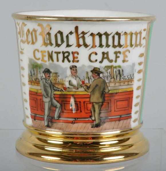 Appraisal: Centre Caf Bar Shaving Mug Description Gilt name Leo Bockmann