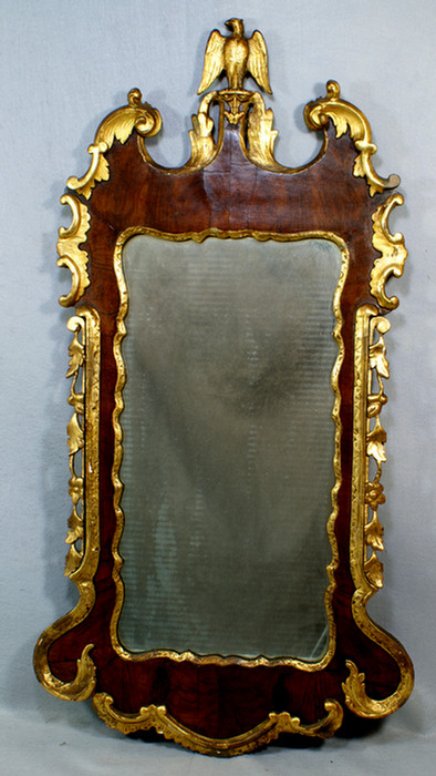 Appraisal: Georgian mahogany veneer and gilr mirror with eagle finial approx