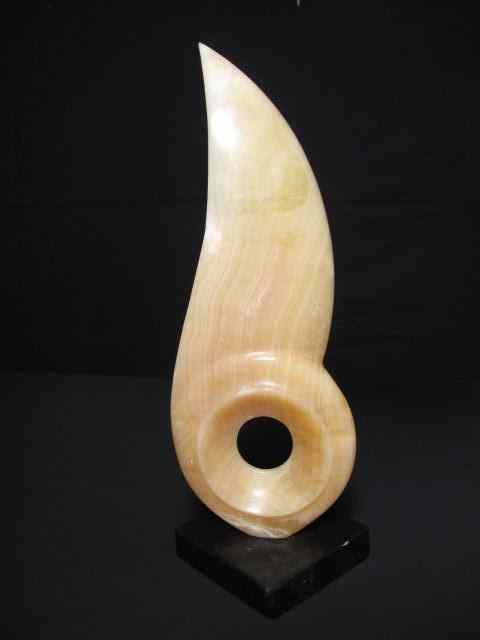 Appraisal: Carved Agate stone abstract sculpture On black marble base Condition