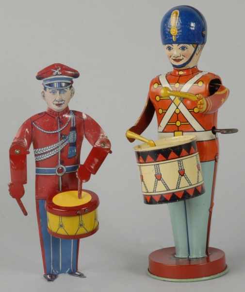 Appraisal: Lot of Tin Chein Drummer Toys Description American Working Includes