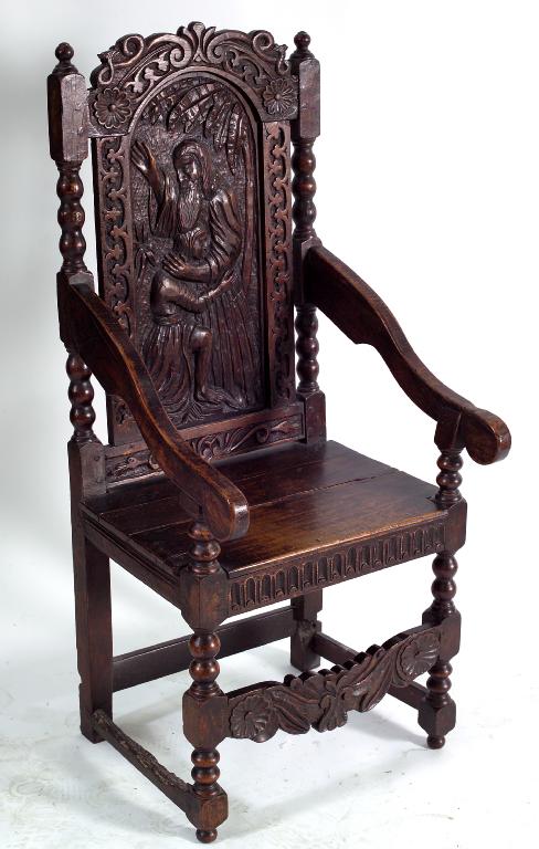 Appraisal: OAK OPEN ARMCHAIR PARTLY MID th CENTURY the arched figural-carved