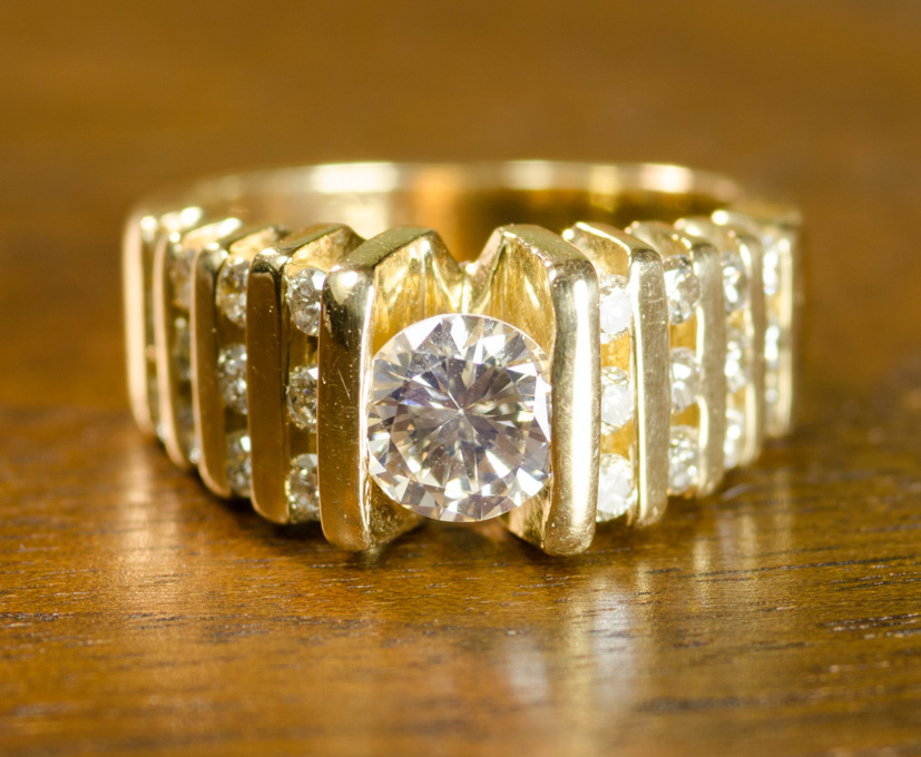 Appraisal: DIAMOND AND FOURTEEN KARAT GOLD RING with appraisal The yellow