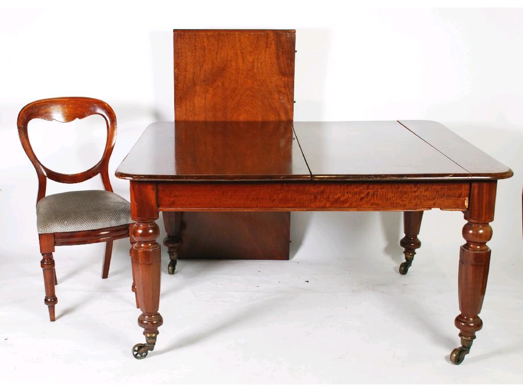 Appraisal: VICTORIAN MAHOGANY WIND OUT EXTENDING DINING TABLE the rounded oblong