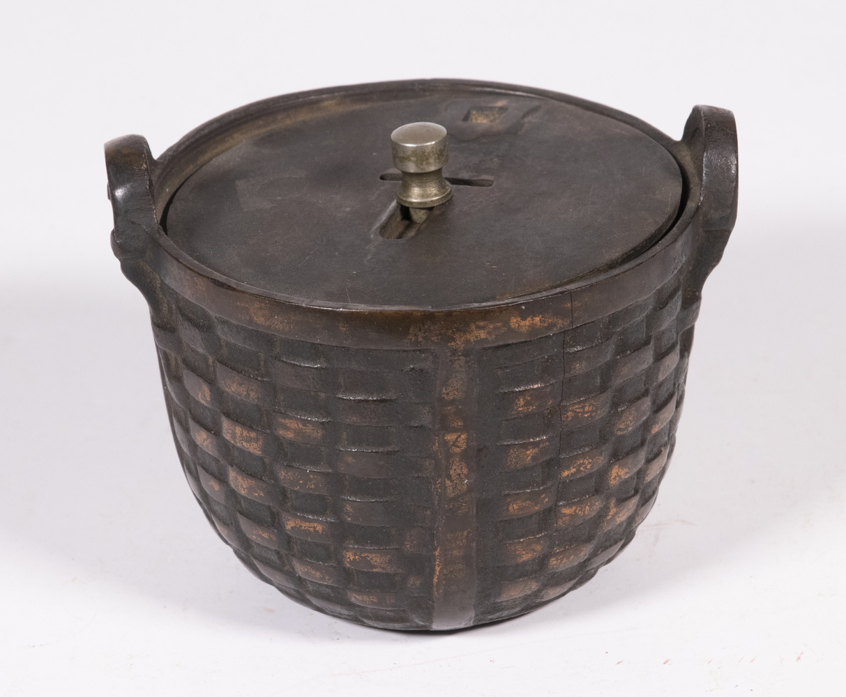 Appraisal: CAST IRON WOVEN BASKET BANK Early th c Basket Form