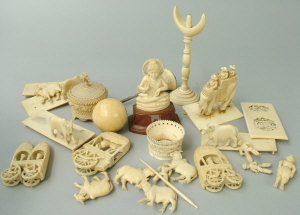 Appraisal: A collection of Chinese ivories to include a carved parasol