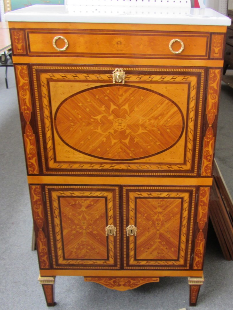 Appraisal: A th century style marble top gilt metal mounted marquetry