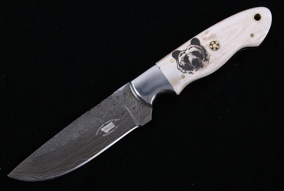 Appraisal: Yellowstone Grizzly Scrimshaw Damascus M T Knives This is an