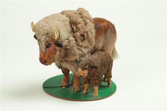 Appraisal: CARVED BISON AND CALF BY J W BRUNGART B GLEN