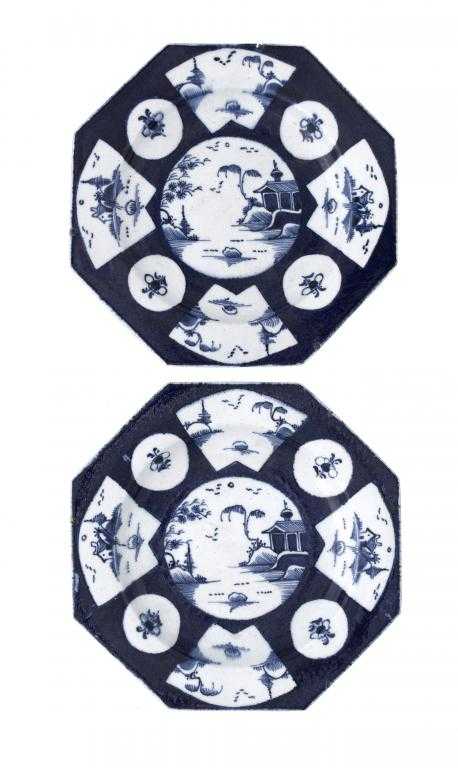 Appraisal: TWO BOW OCTAGONAL POWDER BLUE GROUND PLATES painted in inky