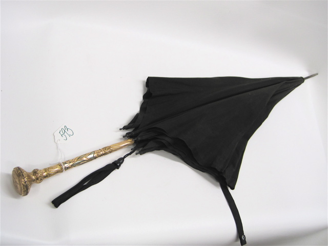 Appraisal: BRASS MOTHER OF PEARL HANDLED UMBRELLA having a black fabric