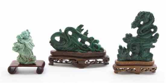 Appraisal: Two Carved Malachite Dragons together with a turquoise figure each