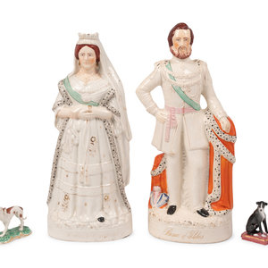 Appraisal: Two Staffordshire Figures Depicting Queen Victoria and Prince Albert th