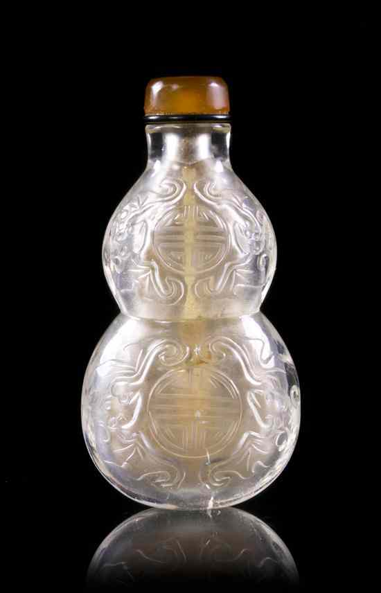 Appraisal: A Carved Rock Quartz Double Gourd Snuff Bottle having carving