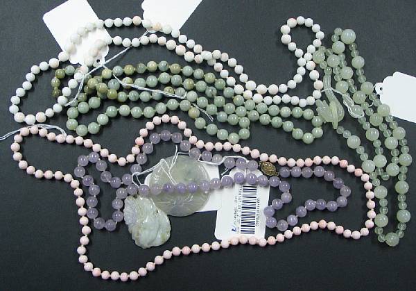 Appraisal: Seven hardstone and coral ornaments Including two coral bead necklaces