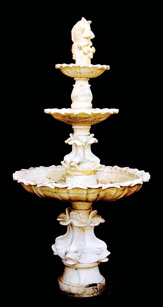 Appraisal: Continental figural carved marble fountain tiered lilypad basins raised on