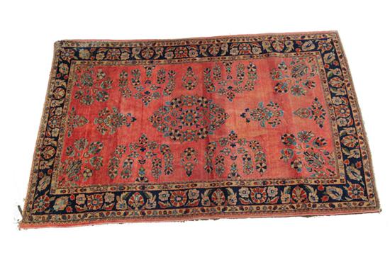 Appraisal: ORIENTAL RUG First half th century Sarouk with red ground