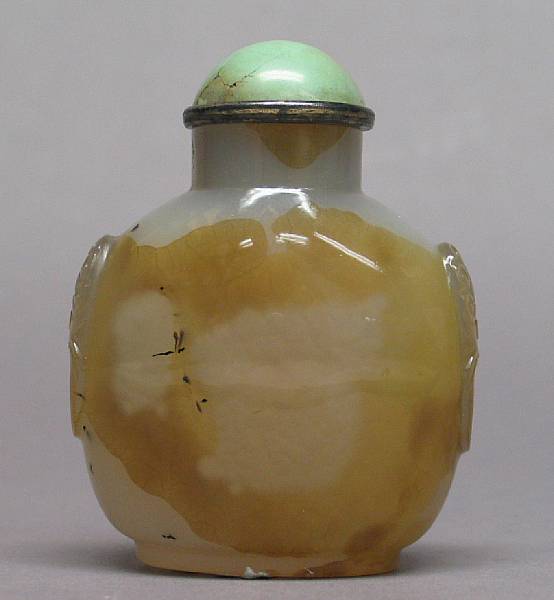 Appraisal: A mottled gray and golden brown agate snuff bottle with