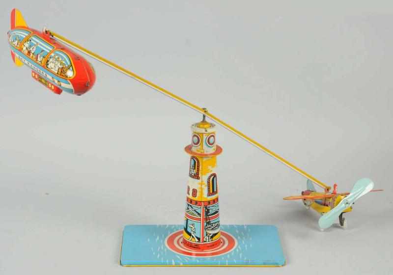 Appraisal: Tin Litho Unique Art Sky Rangers Wind-Up Toy American Working