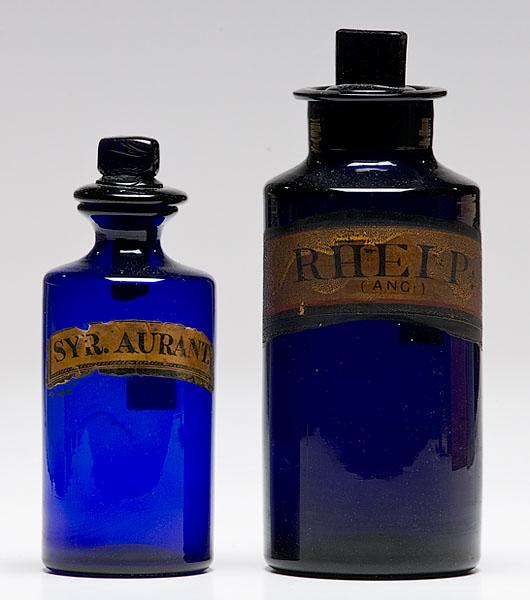 Appraisal: TWO HAND-BLOWN COBALT BLUE APOTHECARY JARS lot of two British