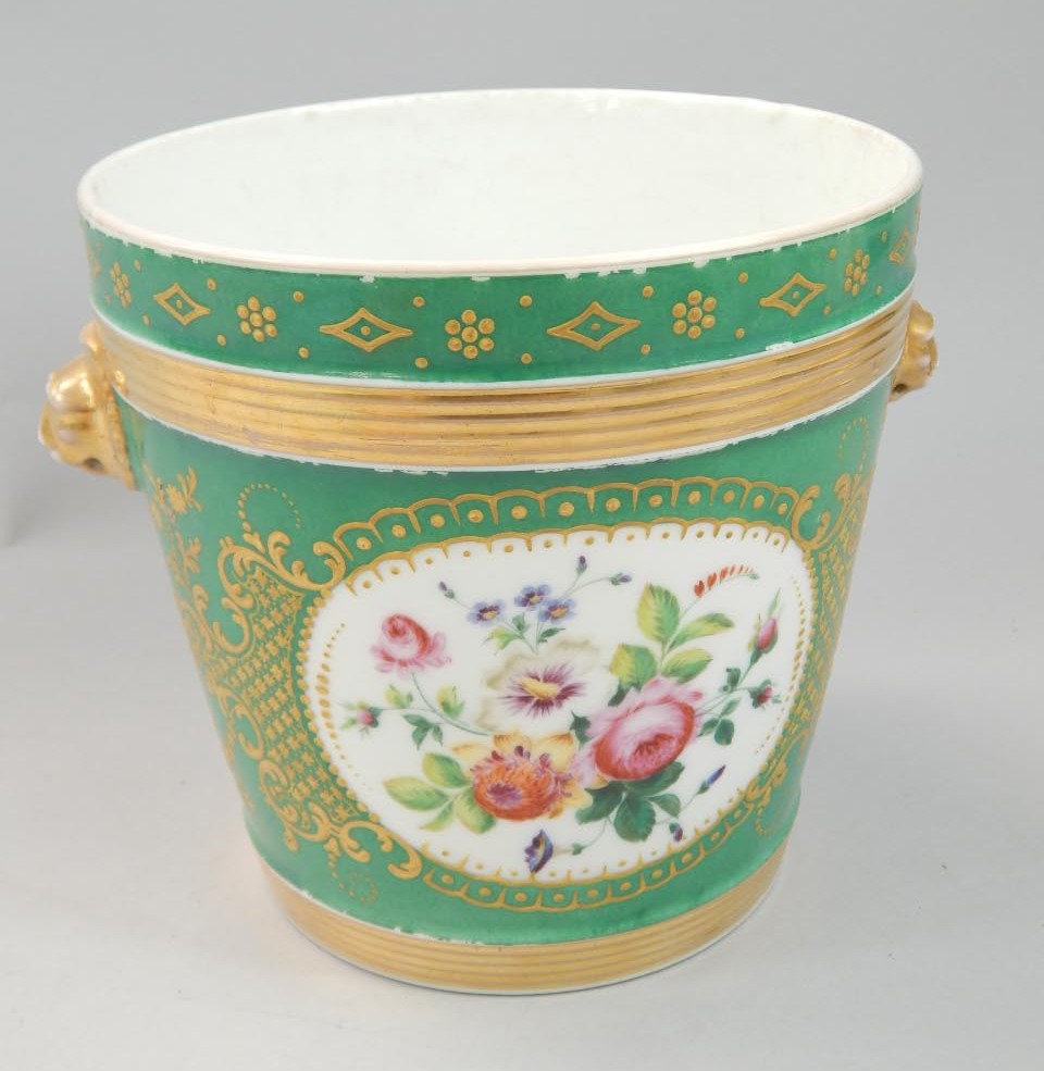 Appraisal: A Paris porcelain two handled jardiniere painted with flowers picked