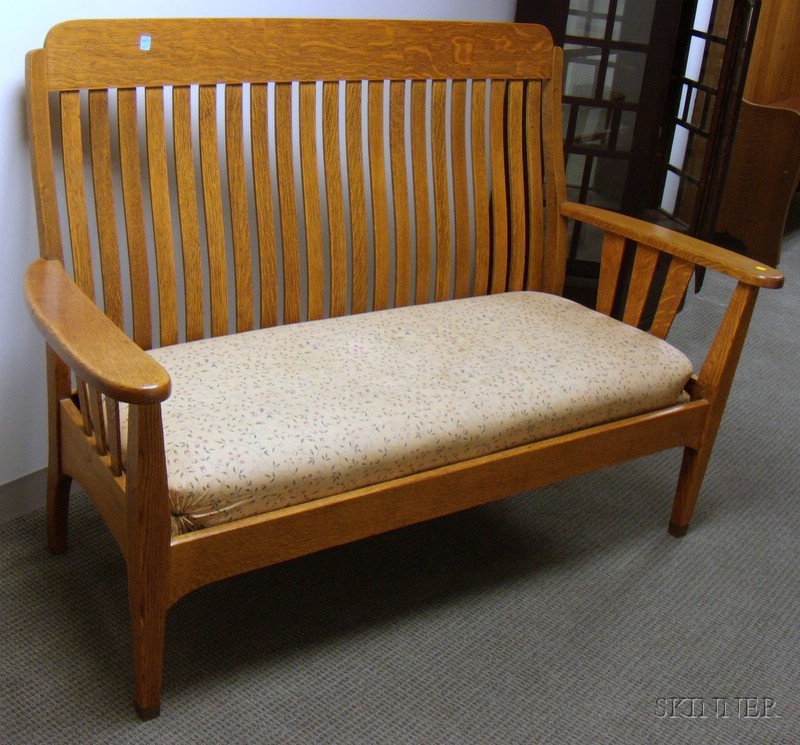 Appraisal: Mission Oak Vertical Slat-back Drop-arm Settle with upholstered cushion seat