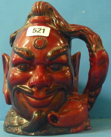 Appraisal: Royal Doulton Large Flambe Character Jug Aladdins Genie D Limited