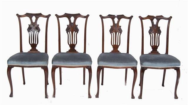 Appraisal: A SET OF FOUR LATE VICTORIAN ROSEWOOD DINING CHAIRS each