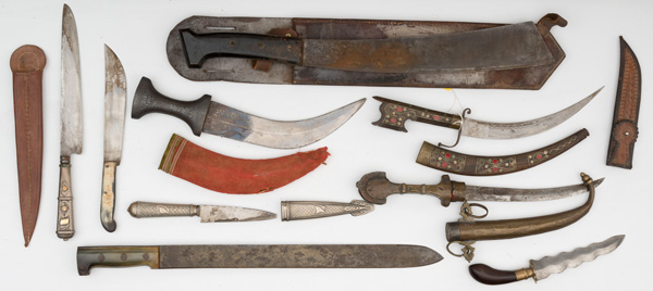 Appraisal: Lot includes two machetes one in scabbard three jambiya two