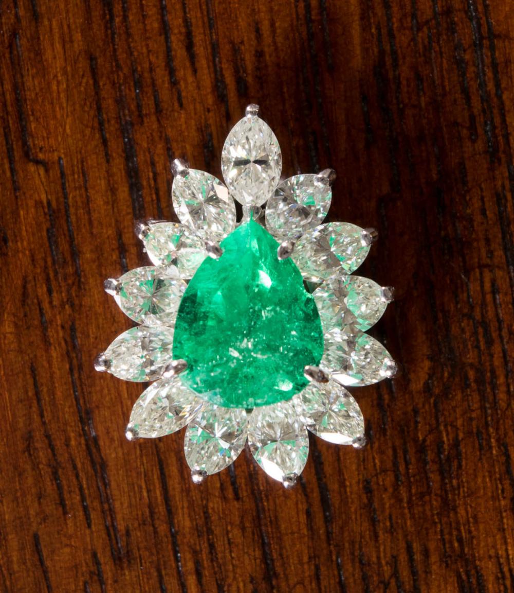 Appraisal: DIAMOND EMERALD AND FOURTEEN KARAT GOLD PENDANT The k white