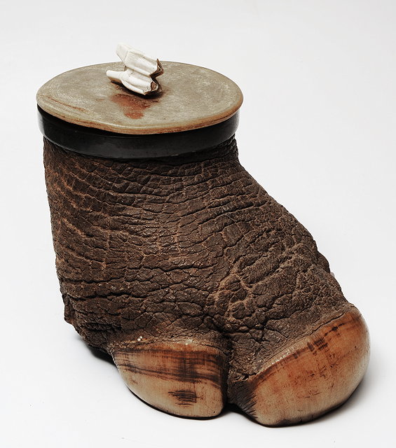 Appraisal: A TOBACCO JAR made from the foot of a rhinoceros