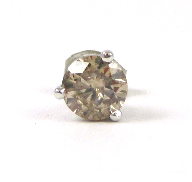 Appraisal: CHOCOLATE DIAMOND AND WHITE GOLD EAR STUD The k white