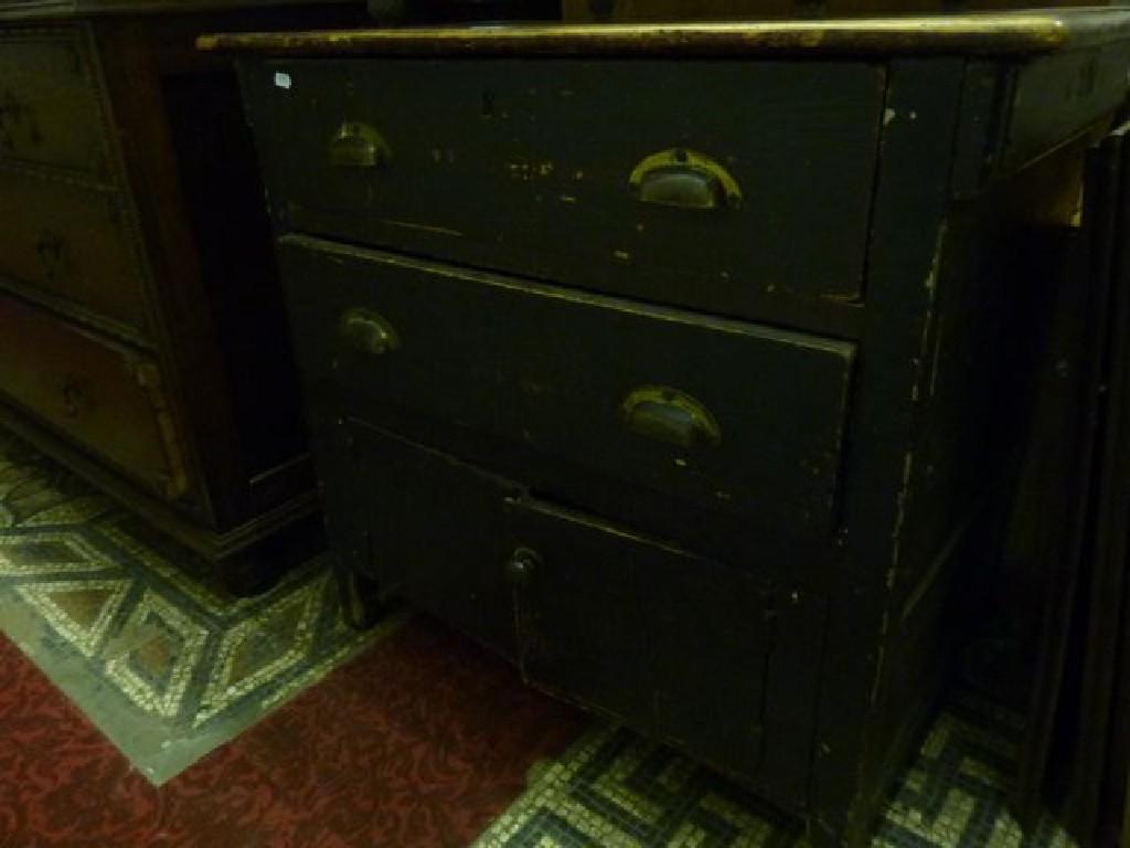 Appraisal: A th century stained pine chest fitted with two long