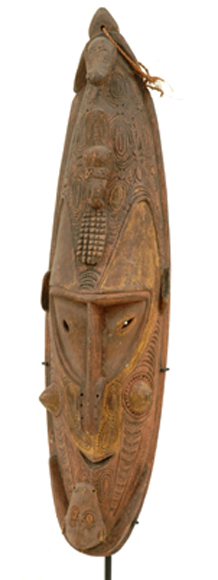 Appraisal: A New Guinea Ancestral Mask having incised decoration all over