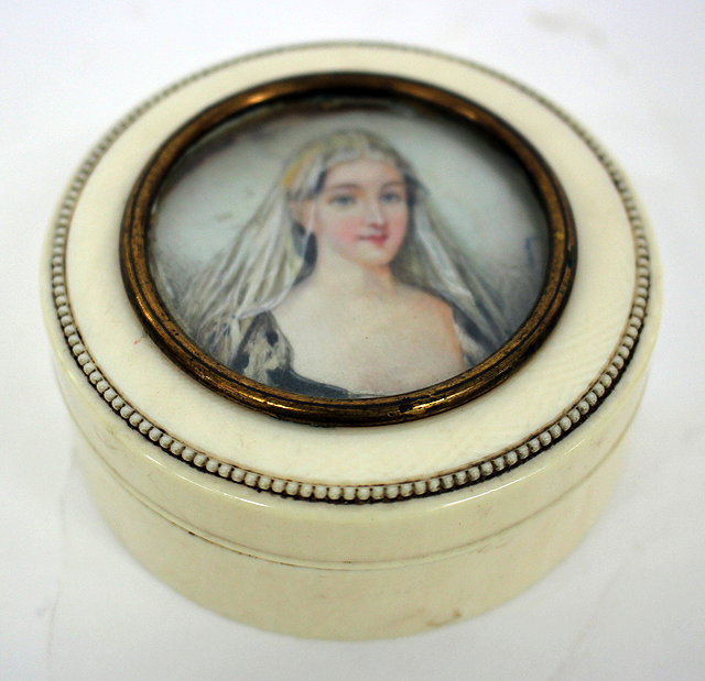 Appraisal: A TH CENTURY CYLINDRICAL IVORY BOX AND COVER inset with