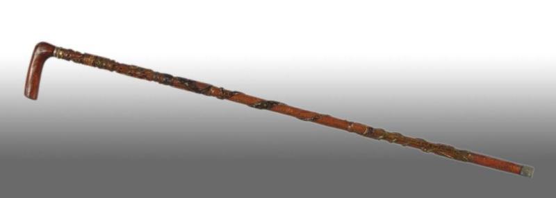 Appraisal: Folk Art Walking Stick Cane Description Hand-carved with hunter smoking