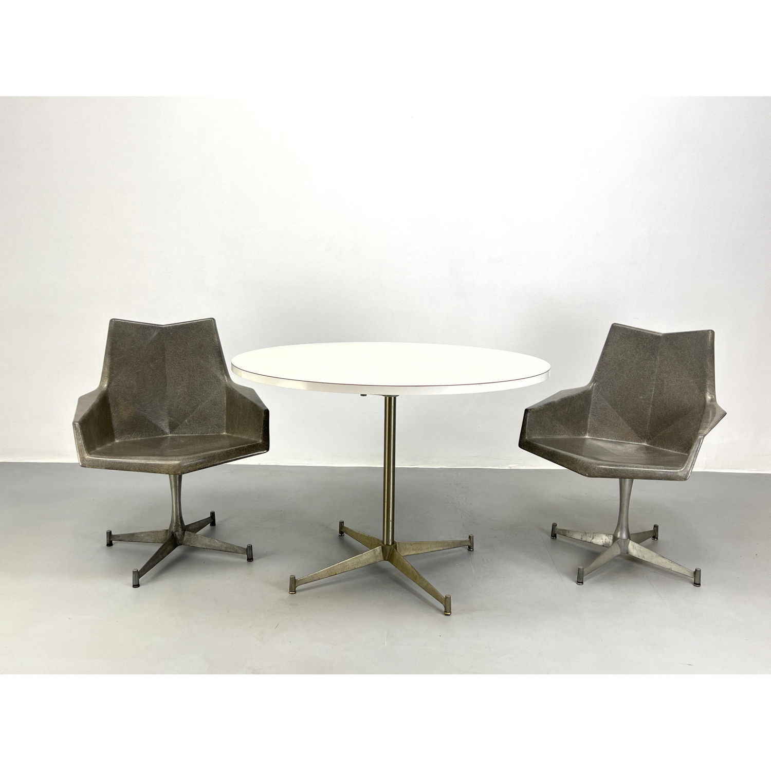 Appraisal: Paul McCobb Elephant Gray Fiberglass Origami Arm Chairs and White