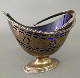 Appraisal: English silver basket form sauce dish with cobalt blue glass