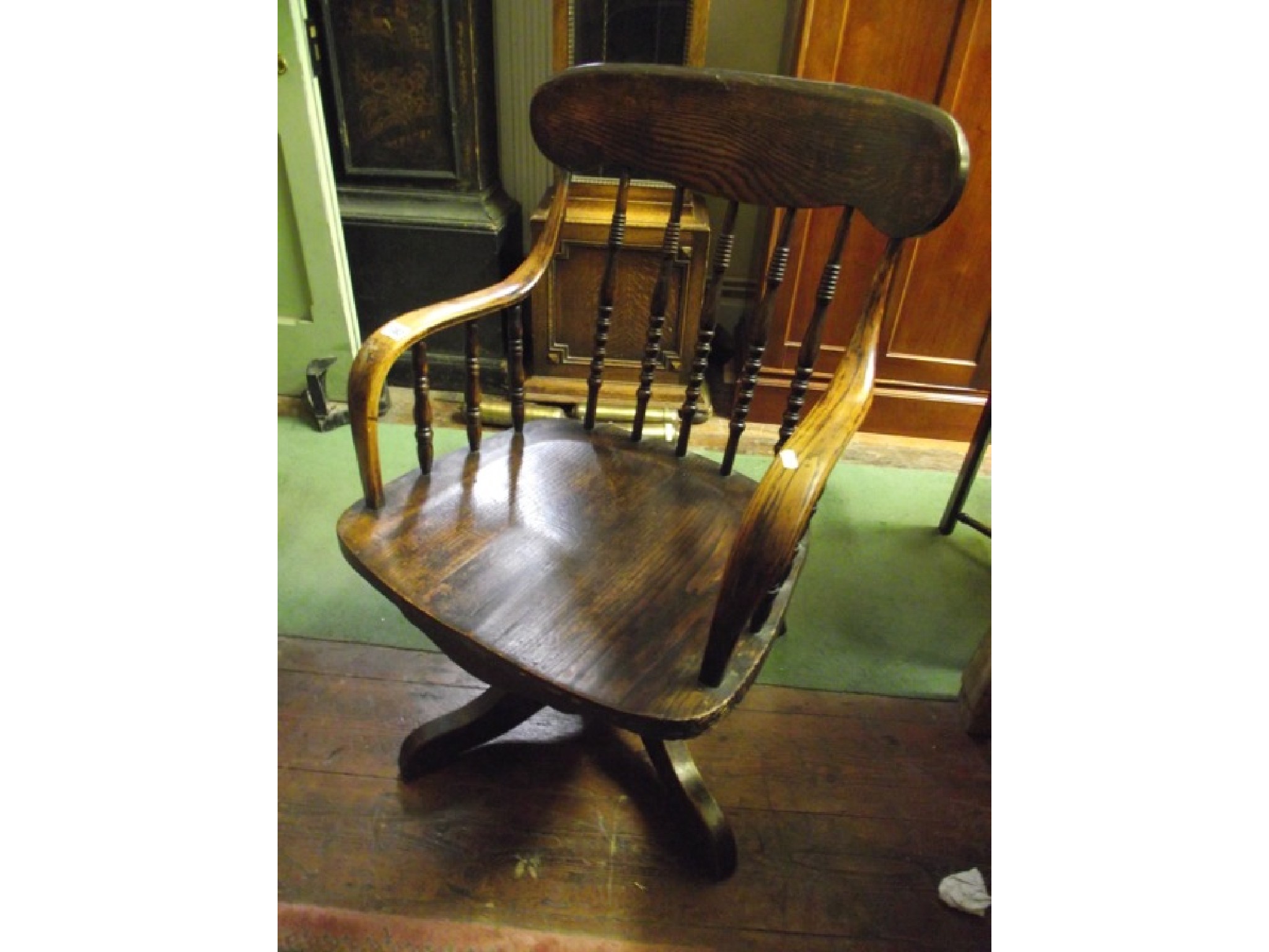 Appraisal: A late th century American ashwood office chair with shaped