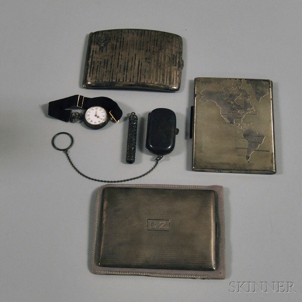 Appraisal: Group of Mostly Silver Accessory Items a sterling silver map-decorated