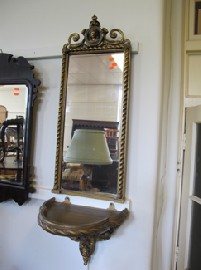 Appraisal: PAIR OF DECORATIVE GOLD PAINTED MIRRORS WITH MATCHING CONSOLES