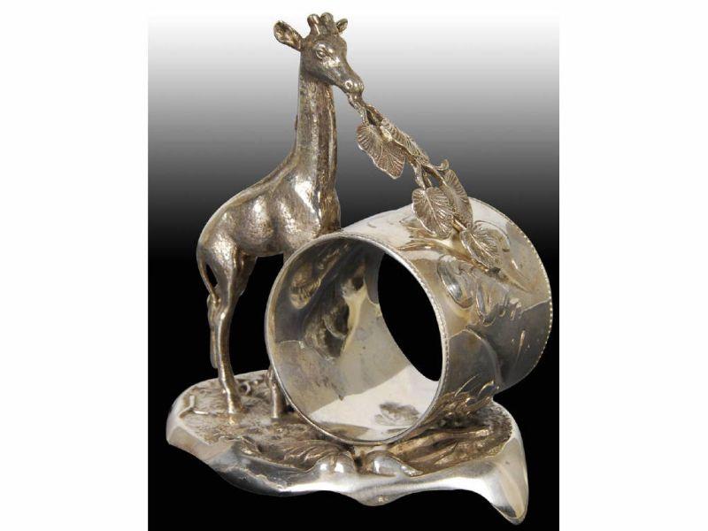 Appraisal: Giraffe Eating Leaves Figural Napkin Ring Description Footed base Marked