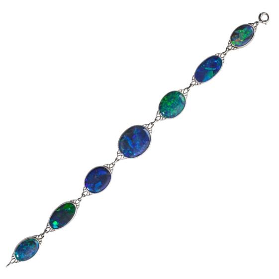 Appraisal: EDWARDIAN AUSTRALIAN BLACK OPAL PLATINUM BRACELET Seven oval black opal